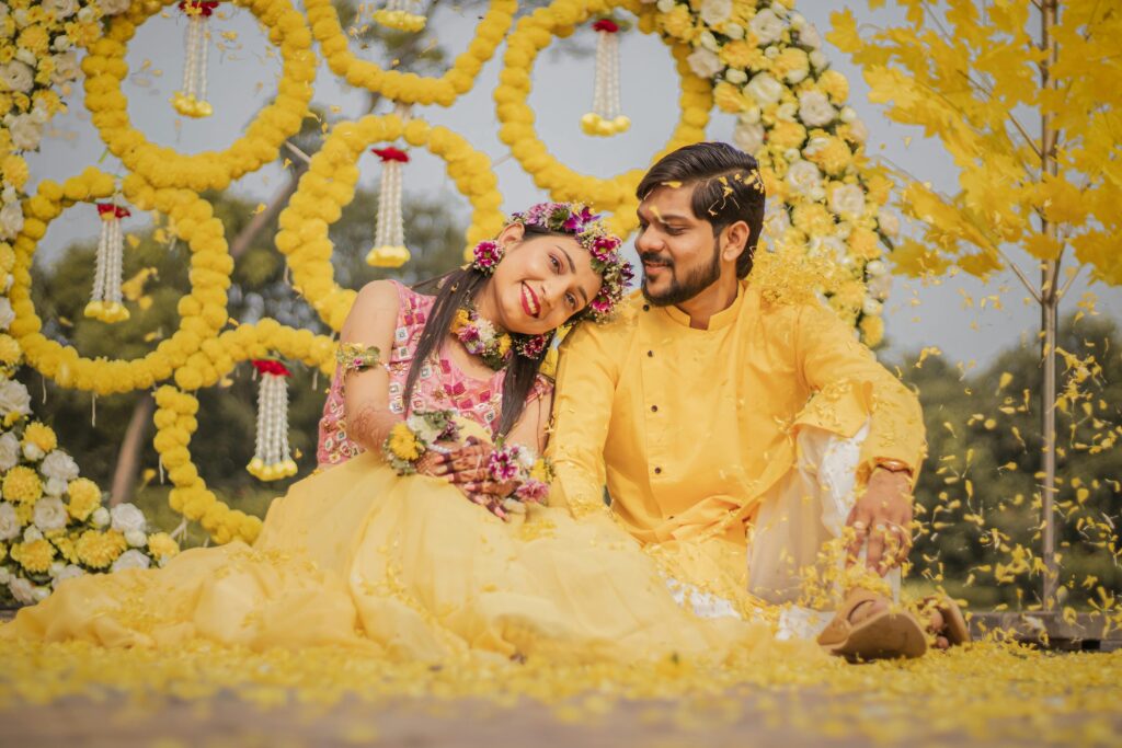 Vibrant Haldi ceremony setup with colorful decor and traditional elements, highlighting the joyful atmosphere by Gaur Wedding Decor.