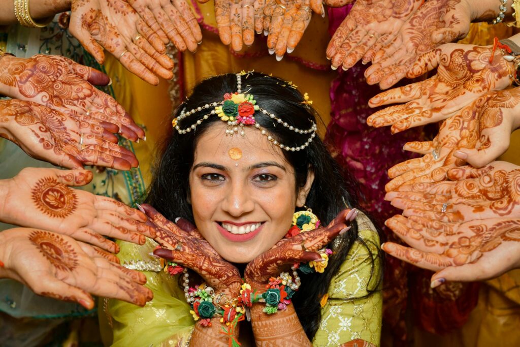 Vibrant Mehendi function decor with traditional elements, created by Gaur Wedding Decor.