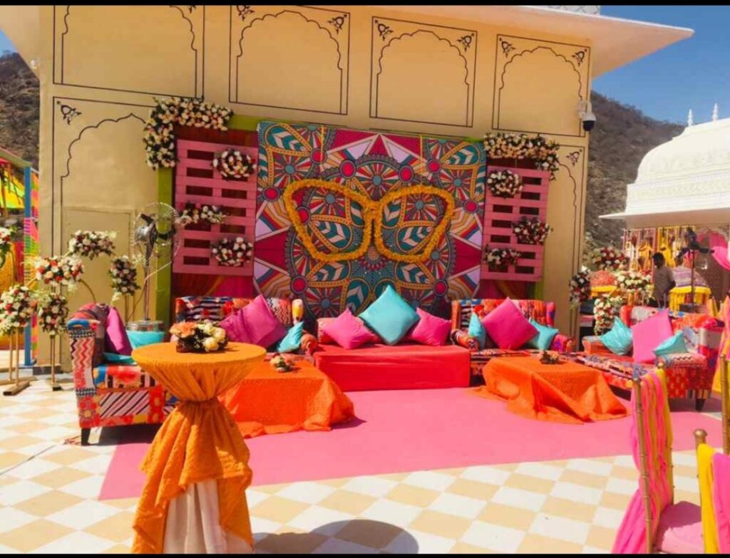 Carnival Mehendi Backdrop: A Fun & Colorful Decor by Wedding Decor by Gaur