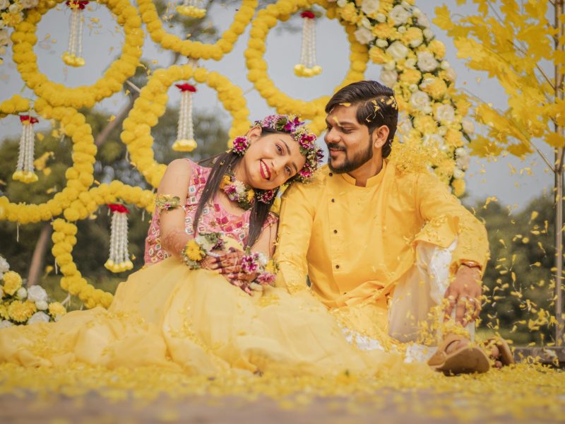 Vibrant Haldi ceremony setup with colorful decor and traditional elements, highlighting the joyful atmosphere by Gaur Wedding Decor.